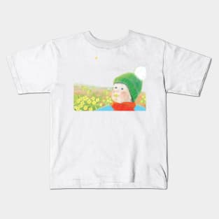 Little boy with primrose flower in mouth Kids T-Shirt